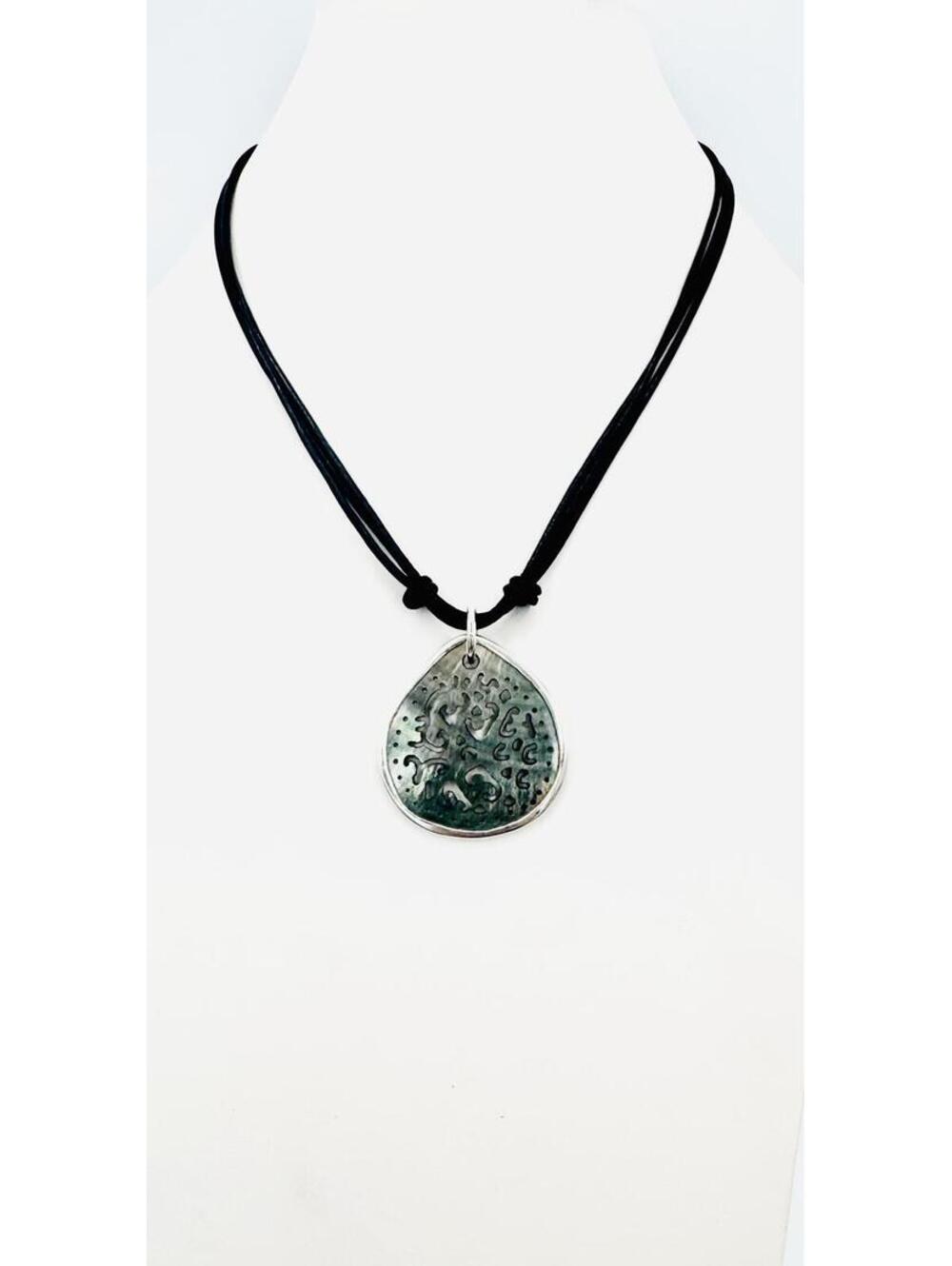 Sterling silver Spilada carved abalone pendant on leather necklace